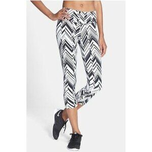 The Nike Women's Legendary Freeze Frame Tights in black and white